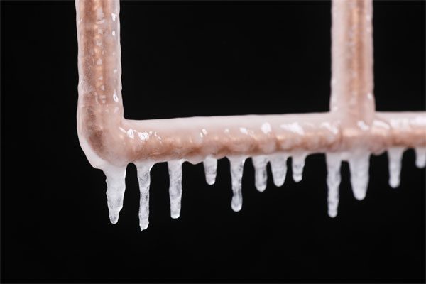 Closeup image of a frozen pipe