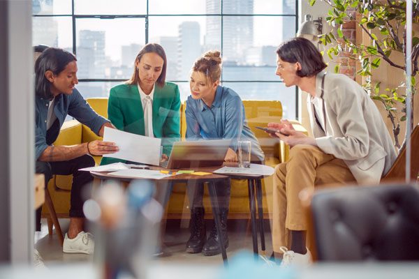 Photo of a business team reviewing documents