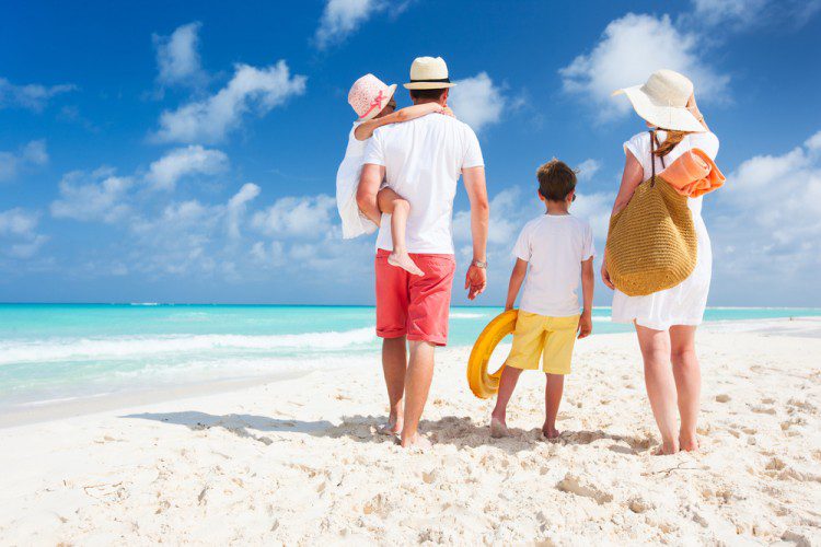 Family on beach together