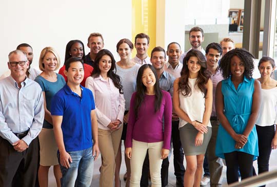 A group of people smiling