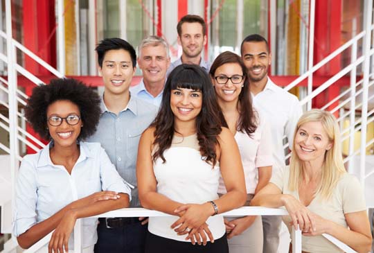 A group of people smiling