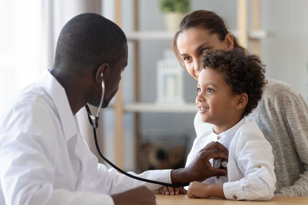 An image of a child at the doctors, used for "The IRS May Soon Be Offering a More Affordable Healthcare Option for Employees" blog post