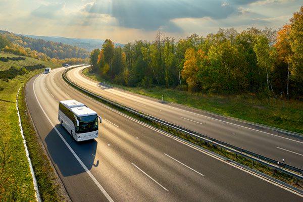 Photo of a private transportation bus on the highway