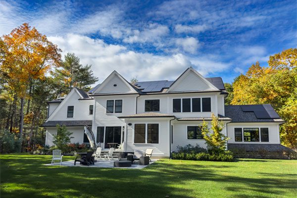 Image of a house with solar panels on the roof